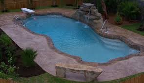 One model, the courtyard roman or roman 19 is the perfect swimming pool if you are looking for a place to just cool off and relax. Waterfalls Largest In Ground Fiberglass Pool Manufacture