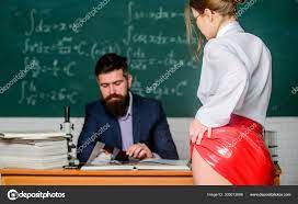 Sexy butt red latex skirt in front of teacher. Private lesson. Seductive  offer. Check knowledge. Desire for knowledge. Sex knowledge. Need for real  experience. Teacher and student. Sexy seduction Stock Photo by ©