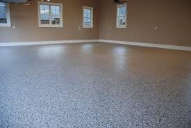 I'm assuming that you are referring to wood laminate flooring not sheet laminate. Inexpensive Garage Flooring Ideas Garage Flooring Epoxy Garage Floor Coverings R Painted Concrete Floors Basement Concrete Floor Paint Painted Cement Floors