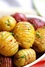Bake the potatoes at 325°f for 45 minutes until they're nice and soft. Potato Recipes Garlic Roasted Potatoes Oven Roasted Potatoes Rasa Malaysia