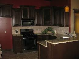 But even i can't help but be wowed by these dark kitchen cabinet colors against clean white walls and upper white cabinets! Light Burgundy Kitchen Walls Novocom Top
