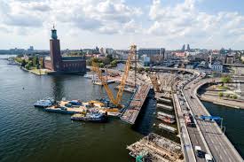 The length is 2140 m, and the maximum height is 48 m. Sarens Sarens Replaces The North And South Part Of The Norrstrom Bridge In Sweden