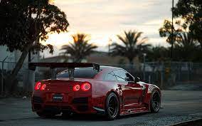 Tons of awesome nissan gtr r35 wallpapers to download for free. Hd Wallpaper Nissan Gtr R35 Red Car Rear View Wallpaper Flare