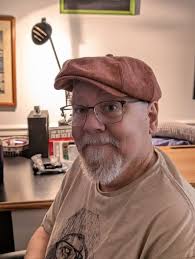 Doug. Your mom standing from right, she is the 7th