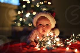 Affordable and search from millions of royalty free images, photos and vectors. Christmas Baby Santa Glimmer Bokeh Child Family Happy Glow Lights By Stephen Little Photo Stock Snapwire