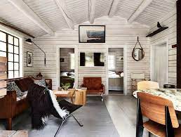 The cantilever yksi cabin (starting from $419,000) is the smaller of the two, with a 'stacked' intersecting structure that contains two bedrooms spread across 1,000 sq ft. Charming Norwegian Style Log Cabin Packed With Iconic Design Pieces Modern Cabin Interior Cabin Interior Design Cabin Interiors