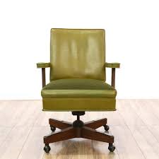 Covered in a durable, easy clean 100. This Mid Century Modern Office Chair Is Upholstered In A Durable Vinyl With A Shiny Light Olive Green Finish Mid Century Modern Office Chair Chair Office Chair