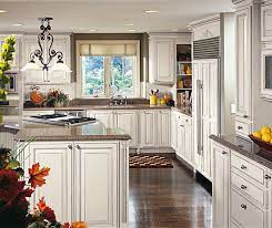 The interior of each cabinet is stained to match the exterior. Off White Glazed Cabinets In Traditional Kitchen Decora