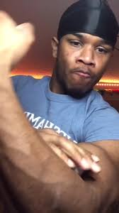 Guy Eating Eggs and Then Flexing Muscles