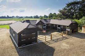 A Lovely U Shape Stable Yard Designed To Meet The Needs Of Wh Equine A Small Equestrian Business Horse Barn Ideas Stables Horse Barn Designs Horse Barn Plans