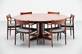 Teak and rosewood dining tables, chairs, armchairs, sideboards and wall units. Dyrlund Extendable Rosewood Dining Table Denmark 1962 Massmoderndesign