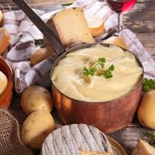 Main Ingredients Aligot The Cheesy Mashed Potatoes Recipe Recipe4living Recipes Cheesy Mashed Potatoes Food