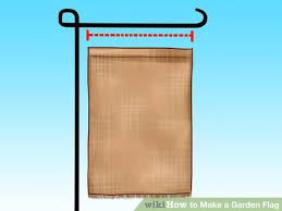 Cut a length of your main flag material to the width of the hanging bar of your flagpole. How To Make A Garden Flag Burlap Garden Flags Garden Flag Diy Flag Diy