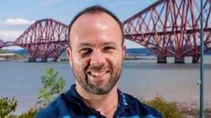 Mike Adamson reaching for the top