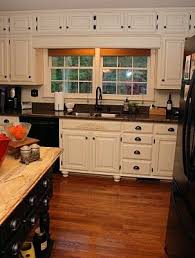 That said, one of the easiest and most affordable ways to give your cooking space a new look is with a fresh lick. Add Feet To The Kitchen Cabinets Distressed Kitchen Cabinets Oak Kitchen Cabinets Antique White Kitchen
