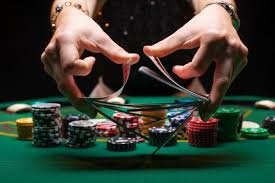 Girl Croupier Shuffles Poker Cards In A Casino Poker Cards Poker Poker Games