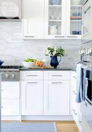 The countertops are very elaborate and fancy, yet the backsplash is very simple. Interior The New Traditional Kitchen Cabinet Design White Shaker Kitchen Kitchen Cabinets Decor