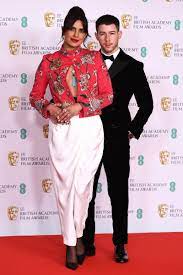 The texan singer, formerly part of the jonas brothers, and the bollywood superstar held a private. Priyanka Chopra Jonas Brought Upcycled Couture To The Baftas Vogue