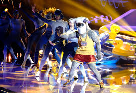 Just like the masked singer, disguised celebrities wear wild costumes to perform and the panelists have to try to guess who it is. The Masked Dancer Tv Show On Fox Season One Viewer Votes Canceled Renewed Tv Shows Tv Series Finale