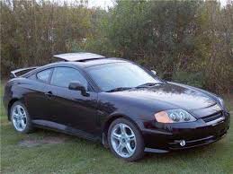 Image result for Pewter Silver 2003 Tiburon