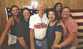 Neighbors come out to support a dying man who supported them