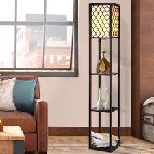 Vintage Wooden Led Floor Lamp With Shelf Black With Pattern Detail Affordablehomewares To reflect ultimate sophistication, most of the people like to have their floor lamps with shelves in wooden material construction.