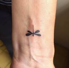 Your spectrum of dragonfly tattoo designs may be wide, but you can have your entire body painted in several designs and still not have everything you'd want. Black Small Dragonfly Tattoo On Inner Arm Below Wrist