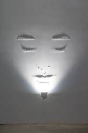 Wall Lighting Throwing A Shadow In The Shape Of A Face Light Art Shadow Art Illusions