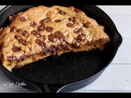Nutella Stuffed Deep Dish Chocolate Chip Skillet Cookie Pizookie Cafe Delites Giant Cookie Recipes Cookie Recipes Desserts