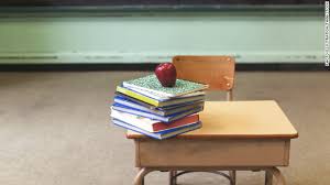 Image result for teacher and a desk