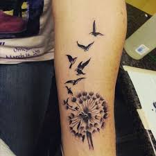 It looks as if the dandelion seeds are becoming birds and this forms an. 52 Best Dandelion Tattoos Design And Ideas