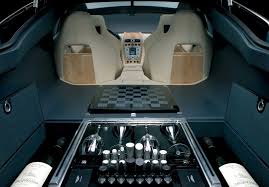 Aston Martin Rapide Interior Includes A Hidden Stash Of Jacquesson Champagne And A Complete Chess Set M Interni Auto Auto Interni