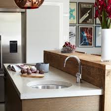 Ruffled curtains in place of doors on the lower cabinets add texture and a splash of personal style. How To Renovate On A Budget 21 Affordable Ideas To Transform Your Home