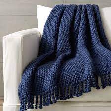 A soft blanket can add a dash of style to any room in the house. Shop Cozy Weave Blue Throw You Ll Love Wrapping Yourself In This Dark Blue Sweater Like Throw Hand Knitted Blue Throw Blanket Navy Blue Throw Blue Bed Throw