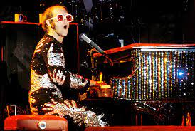 Her tail, her tail keeps me interested. Thoughts On Elton John In The 70s Powerpop An Eclectic Collection Of Pop Culture
