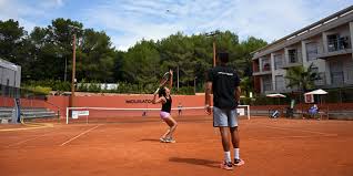 At each center there are 18 lighted courts, 6 quickstart courts, 2 backboards and a pro shop. N 1 Of The World Tennis Academies Mouratoglou Tennis Academy