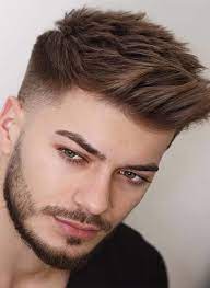 Dark brown hair with subtle auburn highlights keeps it somewhat tame. Mens Hairstyles 2021