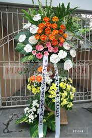 Religious funeral flower messages what to write on funeral flowers for dad or mum when someone passes away, you may want to write a sympathy card message for their family. Standing Arrangement Of White Anthuriums Gerberas Mums And Tuberoses Sympathy Funeral Flowers Flower Patch Online Flower Delivery Phillippines