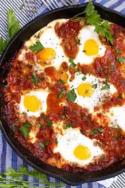 An Authentic Israeli Shakshuka Recipe With Eggs Baked In Richly Spiced Tomato Sauce With Spinach And In 2020 Shakshuka Recipes Shakshuka With Feta Recipe Feta Recipes