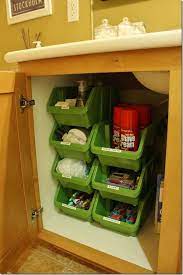 Keep your books and magazines organized! Stacking Bins From The Dollar Tree For Under Sink Storage By Lesa Apartment Kitchen Organization Small Bathroom Storage Apartment Storage