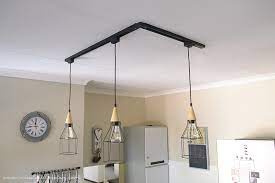 Extensive pendant light buying guide setting out designs, types, shade options, materials, styles, cost and bulb options. How To Diy A Caged Pendant Track Light Windmill Protea