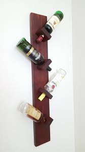 Wine Liquor Bottle Wall Rack Wine Holder Wine Decor Holds 4 Bottles By Woodedwinedesigns On Etsy Wine Holder Wooden Wine Rack