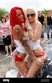 Lexy Roxx JanaKiss Sexy car wash in association with MyDirtyRacing at speed  tuning nation meeting held at GroSSenhain airport Stock Photo - Alamy