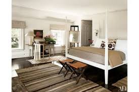 There's a fireplace and a widescreen tv on the wall, in front of the bed. 65 Home Office Ideas That Will Inspire Productivity Architectural Digest