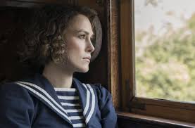 There is nothing less cinematic than someone sitting at a desk with brow furrowed, putting. Film Review Colette