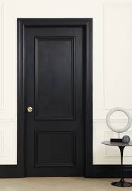 I was not crazy about the view of the garage through the window nor was i crazy about the bland, white paint on the door. Expert Advice How To Choose Paint Like A Pro Remodelista Door Design Interior Black Interior Doors Wood Doors Interior