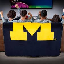 This michigan wolverines throw blanket gives you endless comfort for your endless fan experiences. Michigan Wolverines Throw Blanket Denali Home Collection