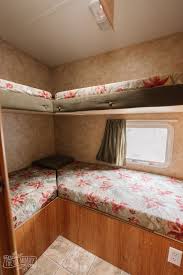 Mark started out by placing 1x1's around and framing the bed. Pink Floral Bunk Room Makeover Our Diy Camper 2 0 The Diy Mommy