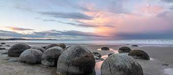 These large and spherical partially submerged boulders are found on koekohe beach, between the towns of moerkai and hampden. Things To See And Do In Moeraki New Zealand