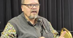 Peterson, a man of many voices, receives Service Award